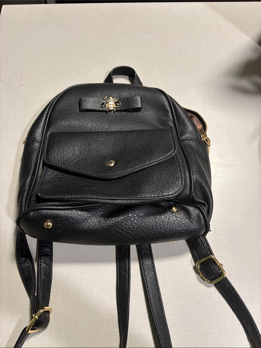 Women's Black Leather Mini Backpack with Gold Bee Accent